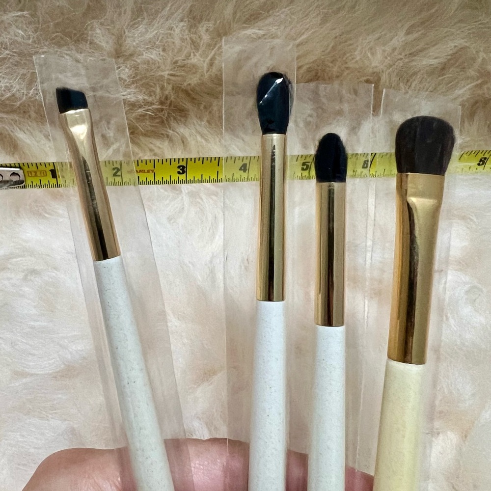 A set of four eyeshadow brushes